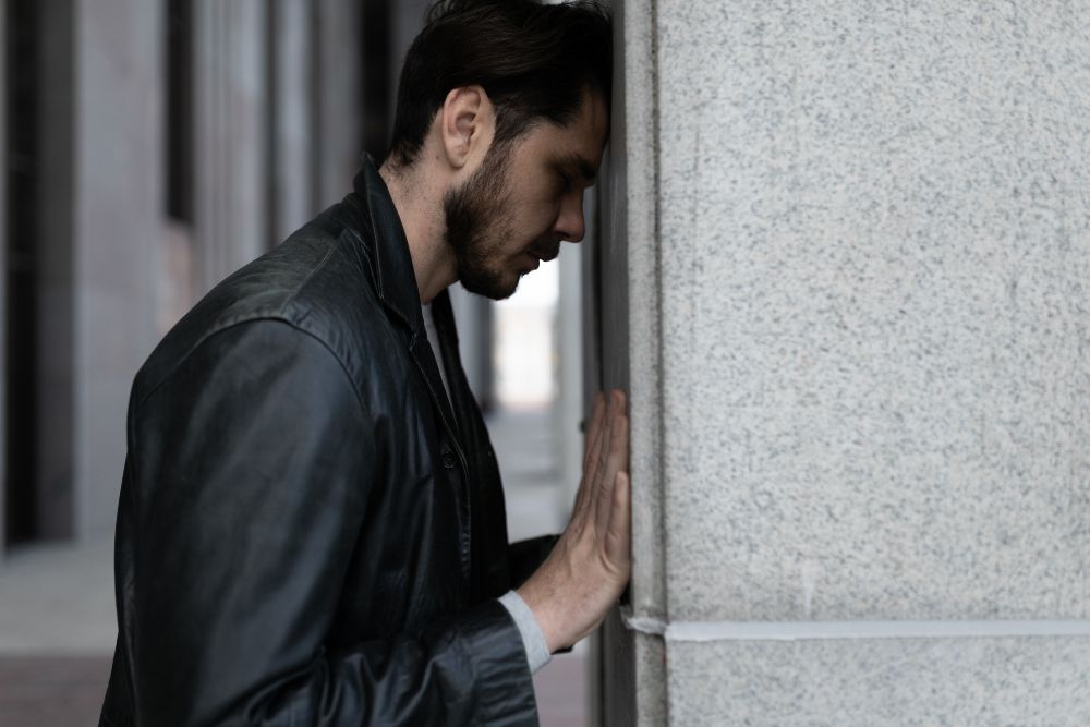 Stressed young professional male. Learn how Cognitive Behavioral Therapy (CBT) in Evanston, IL can be your weapon against stress. Speak with an CBT therapist today to learn more!