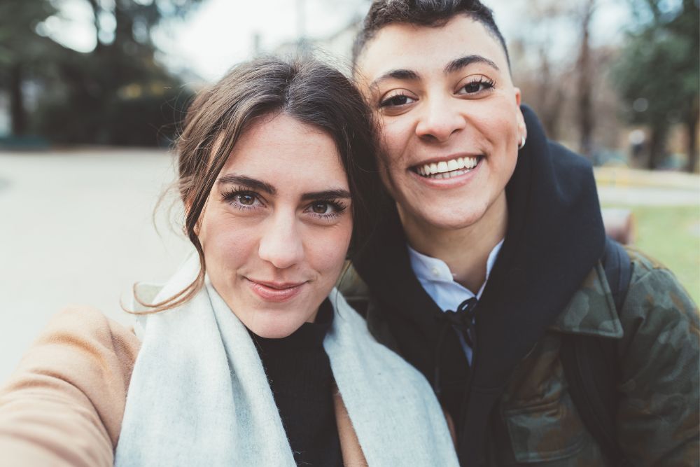 A woman couple taking a selfie. Want to transcend LGBTQ+ stigma in Evanston, IL? It might be time to seek out LGBTQIA+ Affirmative Therapy in Illinois. Speak with an LGBTQ+ Affirming therapist today to learn more!