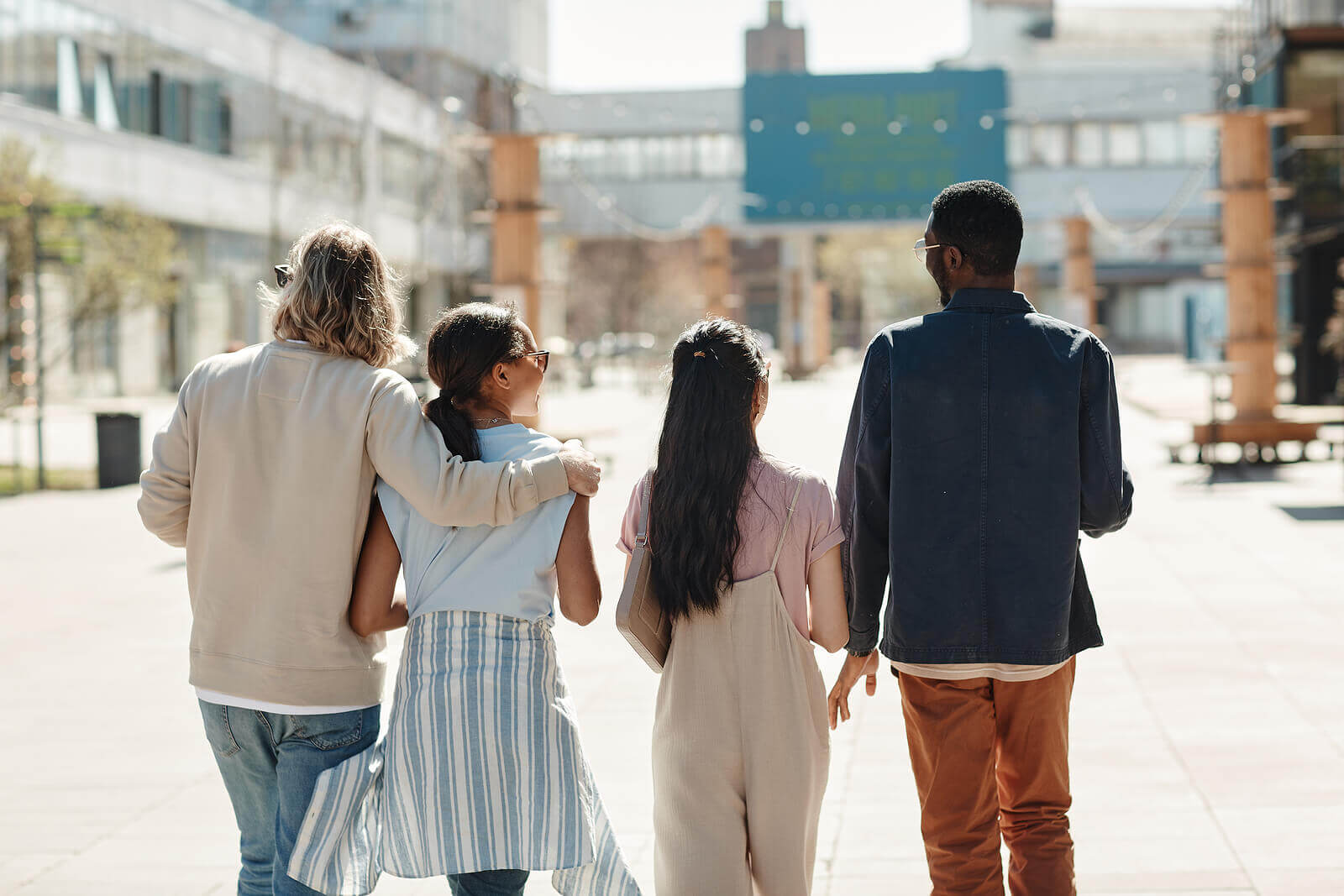A group of friends walk on the street. Has your social anxiety stopped you from being happy? It might be time for Cognitive Behavioral Therapy in Evanston, IL to see how CBT for anxiety can hep you!