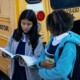 11:12 PMClaude responded: Two teen girls standing by a school bus reviewing papers together, representing the social navigation and academic pressures of high school that can be support…Two teen girls standing by a school bus reviewing papers together, representing the social navigation and academic pressures of high school that can be supported through an online therapist for teens in Evanston, IL and online therapy for teenagers in Evanston, IL.