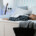 A teen boy lying on his bed with his backpack nearby, representing the emotional exhaustion of school avoidance that can be addressed through teen therapy in Evanston, IL with support from an Evanston teen therapist.